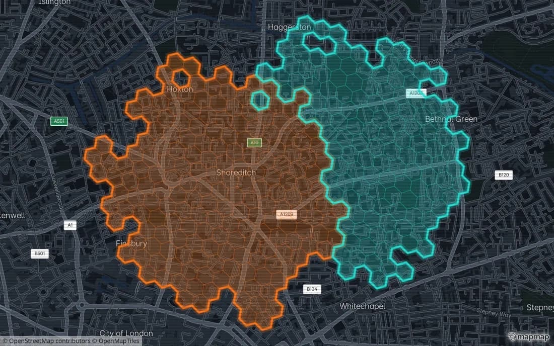 Two neighbouring territories in orange and cyan meeting at a shared boundary over a street map of Shoreditch